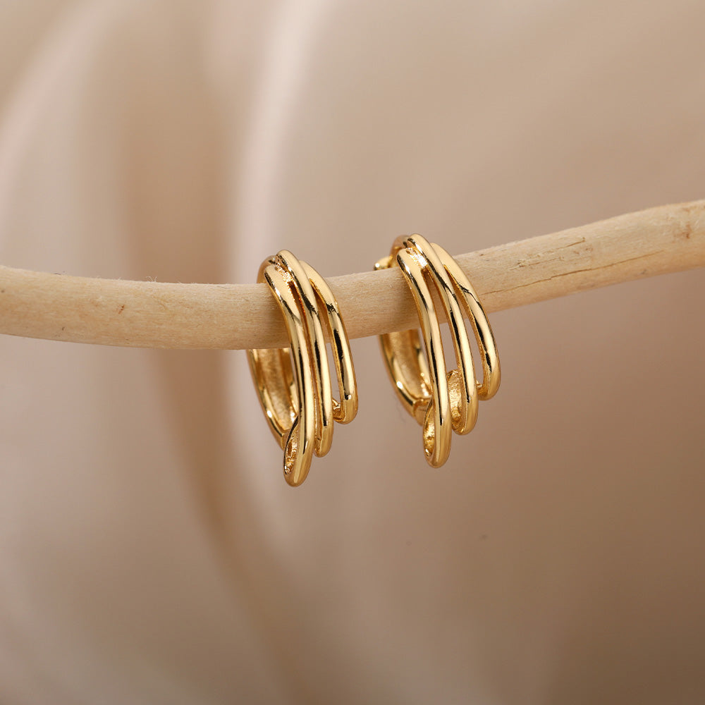 Aretes Minimalistas Redondos en Oro