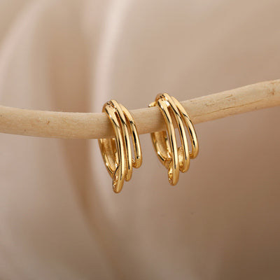 Aretes Minimalistas Redondos en Oro