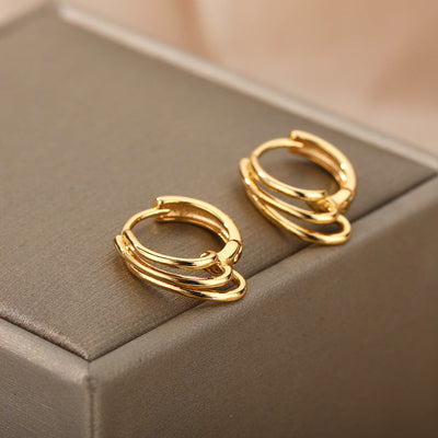 Aretes Minimalistas Redondos en Oro