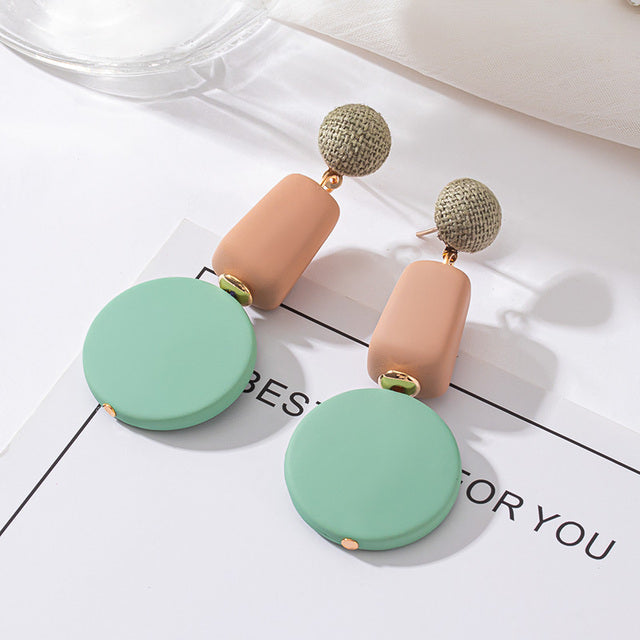 Aretes de Lujo Redondos Turquesas en Oro